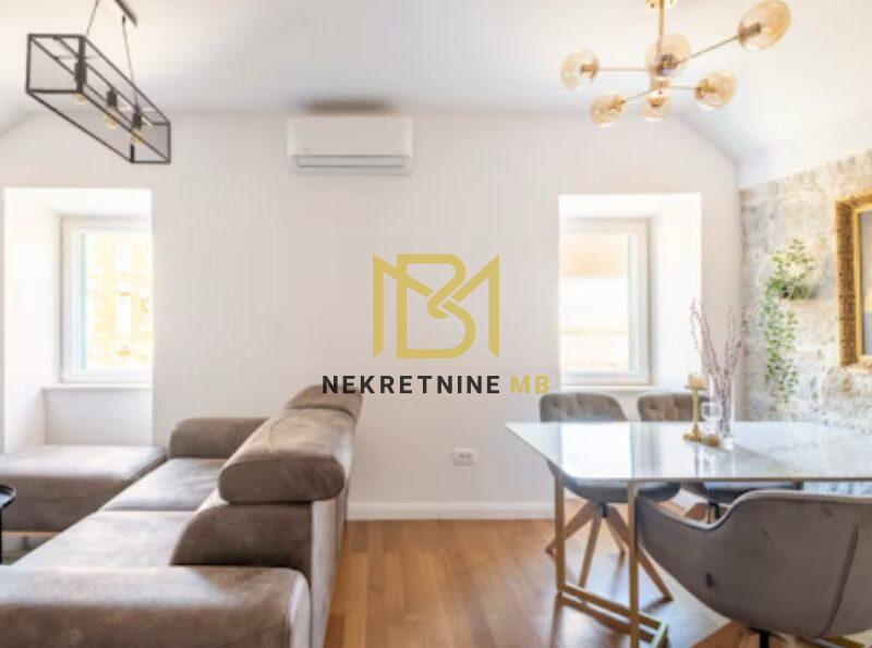 Prodajemo dvosobni stan + studio apartman u centru grada, površine 78m2